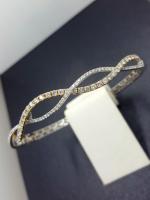 <h2></h2><p>14K White and Yellow Gold<BR />Diamonds: 1.03ct<BR />Regular Price: $6250<BR />ON SALE $2500<BR /><BR />#AN702
</p>